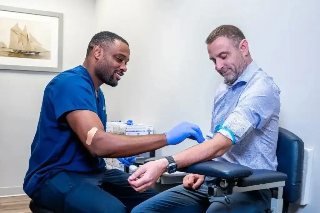 A clinician preparing on-site lab work during a clinic visit